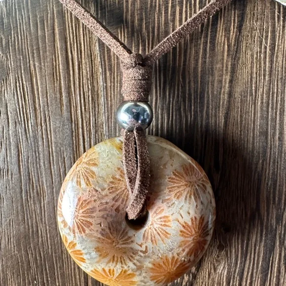 Light Yellow Coral Fossil Donut Pendant Necklace on Brown Faux Suede - Picture 8 of 11